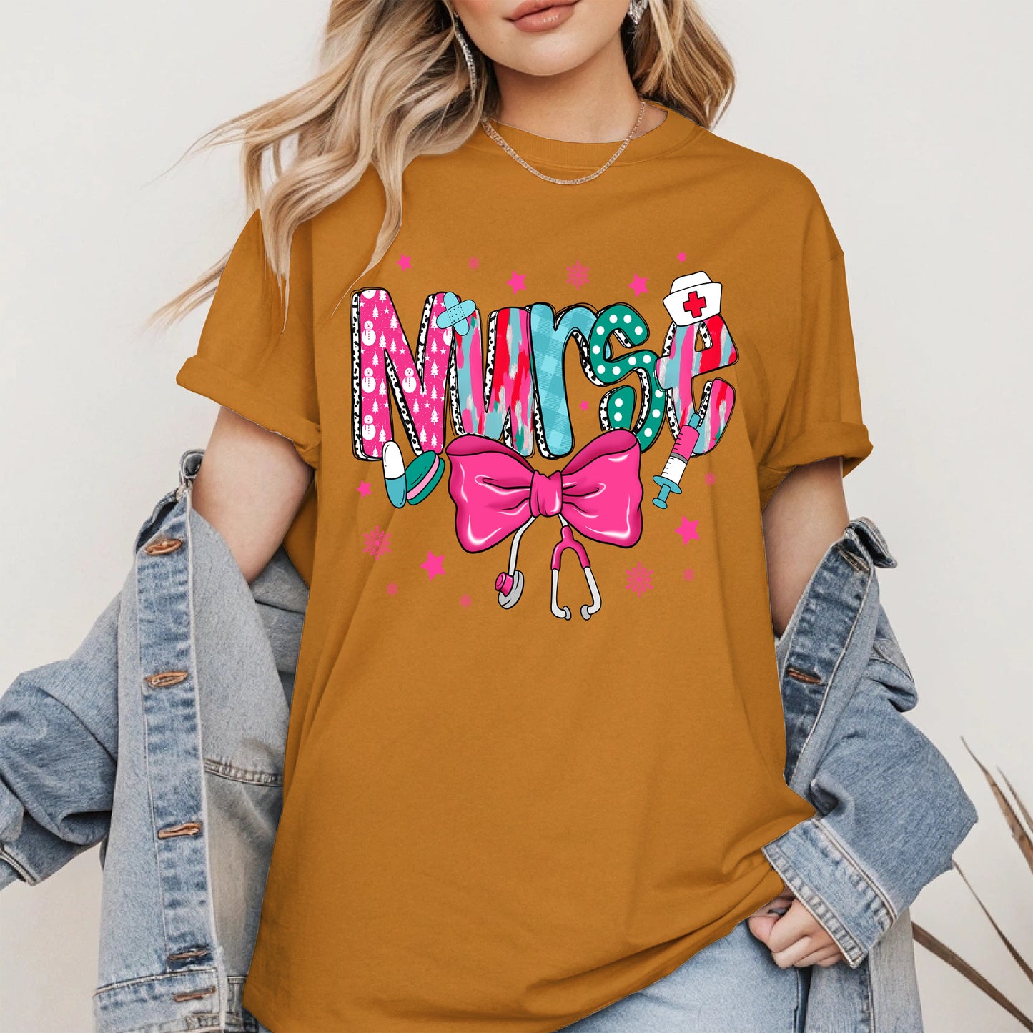 Nurse Christmas Shirt with Pink Bow and Holiday Icons