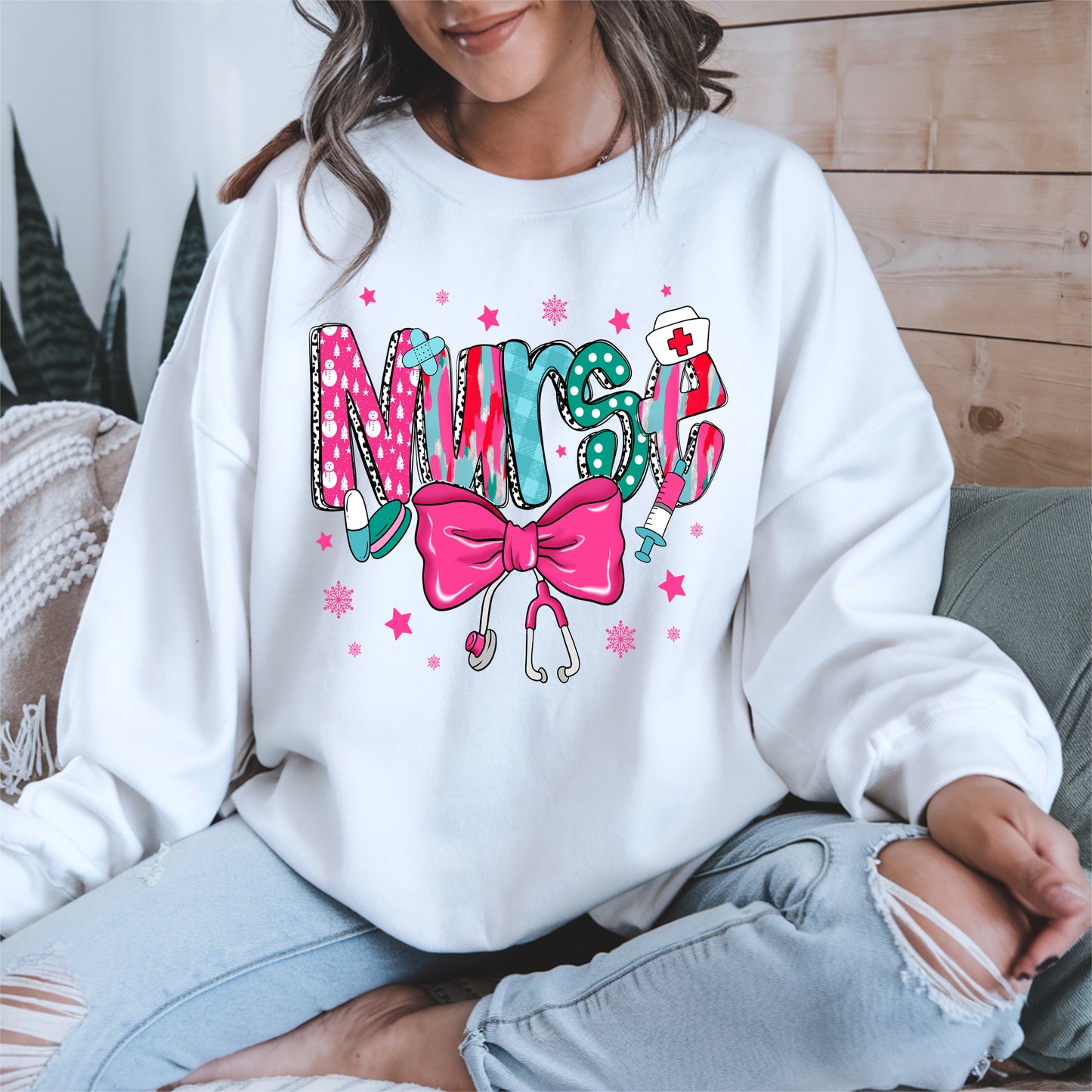 Nurse Christmas Shirt with Pink Bow and Holiday Icons