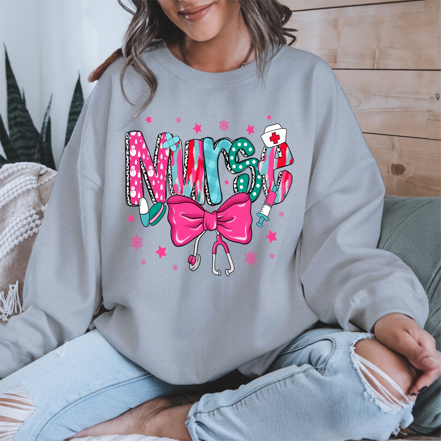 Nurse Christmas Shirt with Pink Bow and Holiday Icons