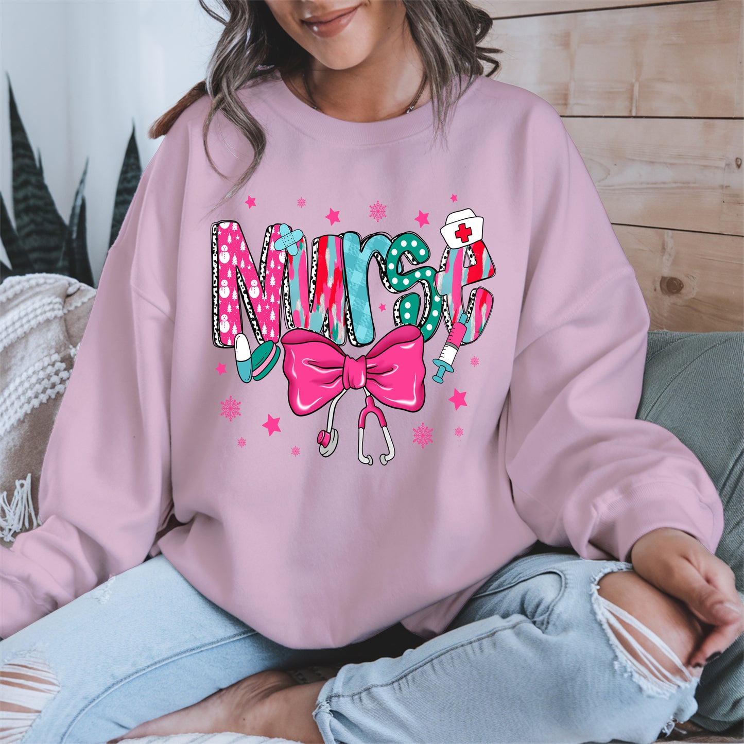 Nurse Christmas Shirt with Pink Bow and Holiday Icons