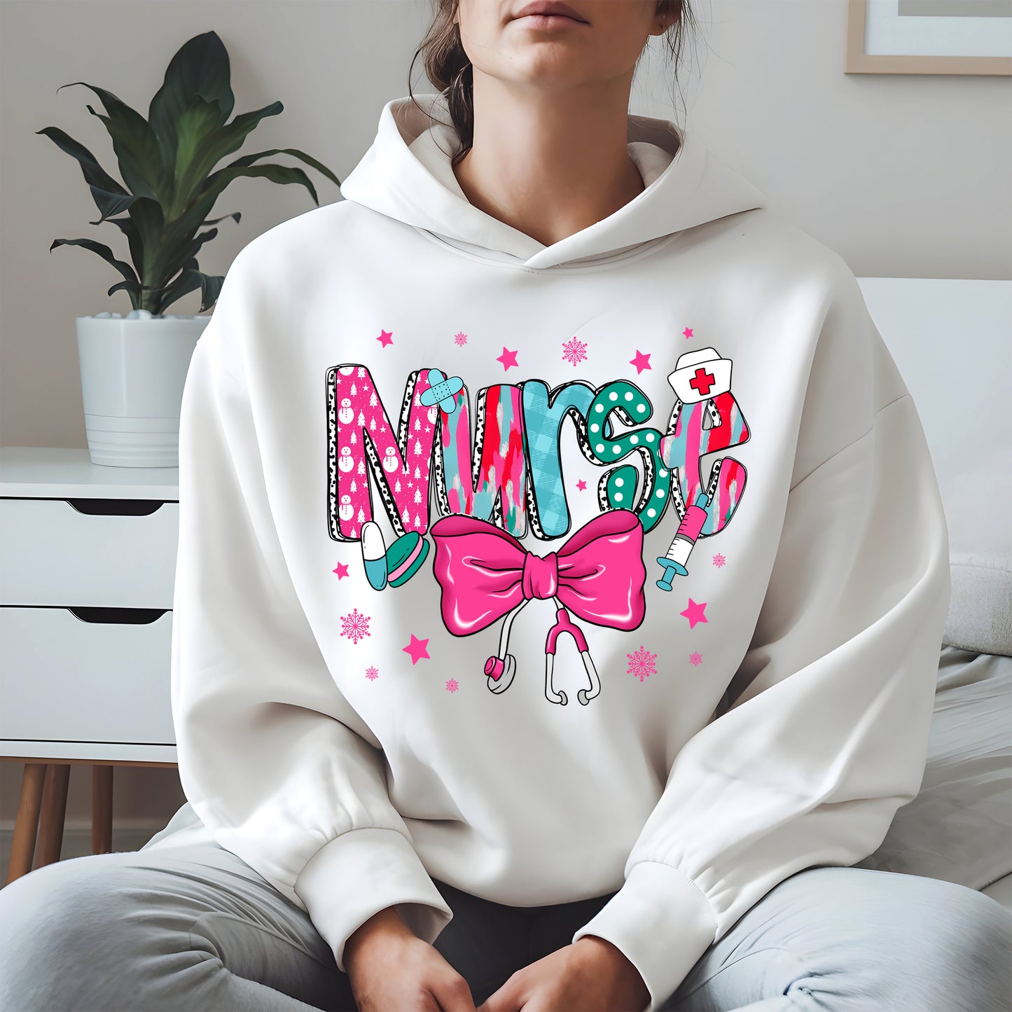 Nurse Christmas Shirt with Pink Bow and Holiday Icons