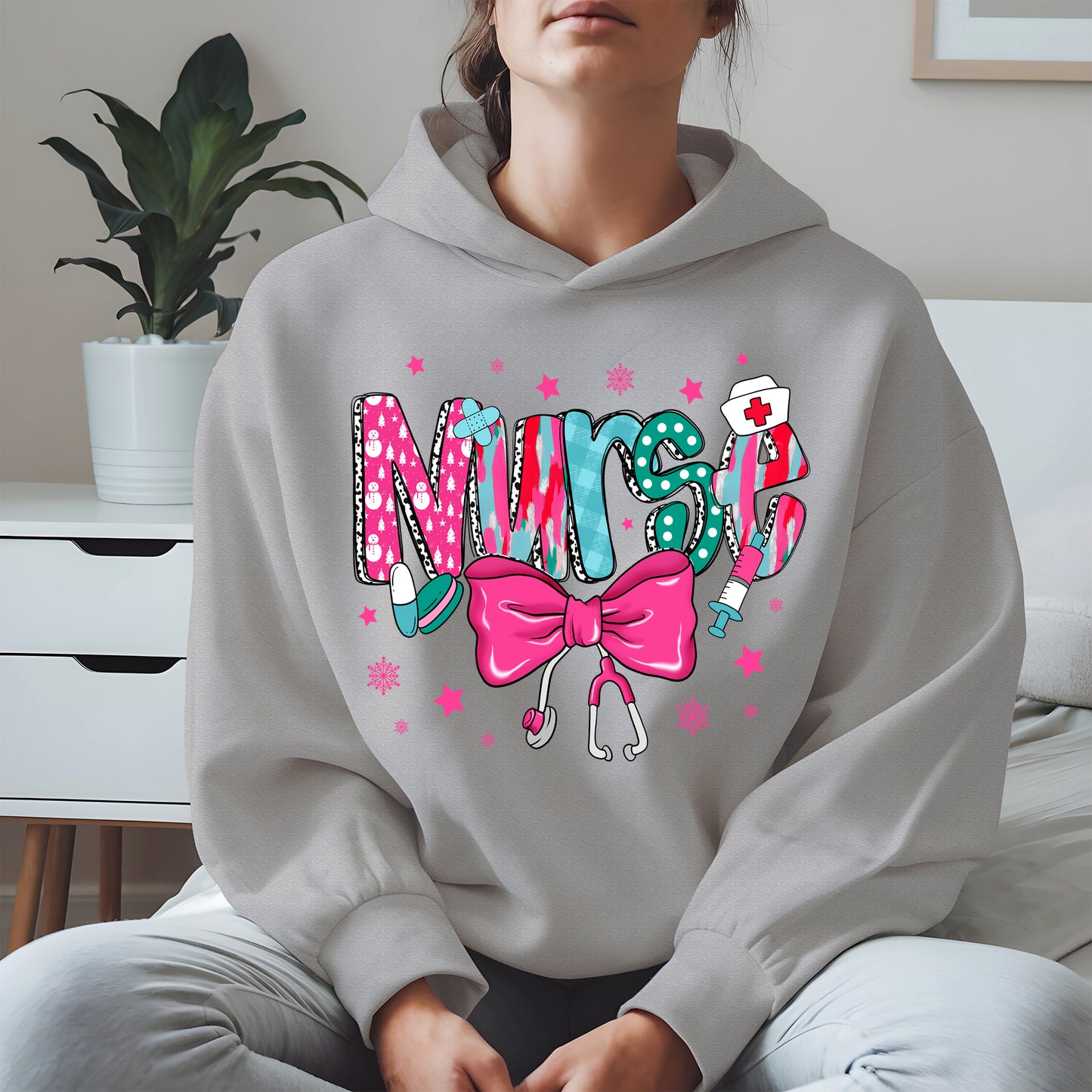 Nurse Christmas Shirt with Pink Bow and Holiday Icons